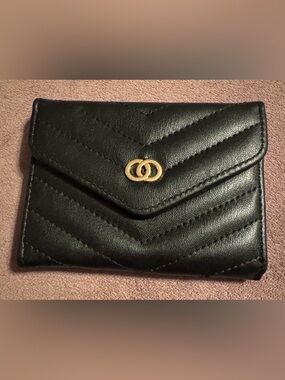 LA Express Black Quilted Wallet with Gold Interlocking Accent